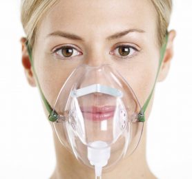 Woman Wearing Oxygen Mask